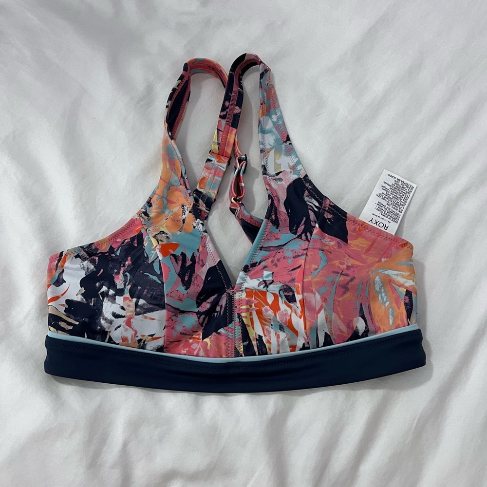 this bikini top has never been worn before!